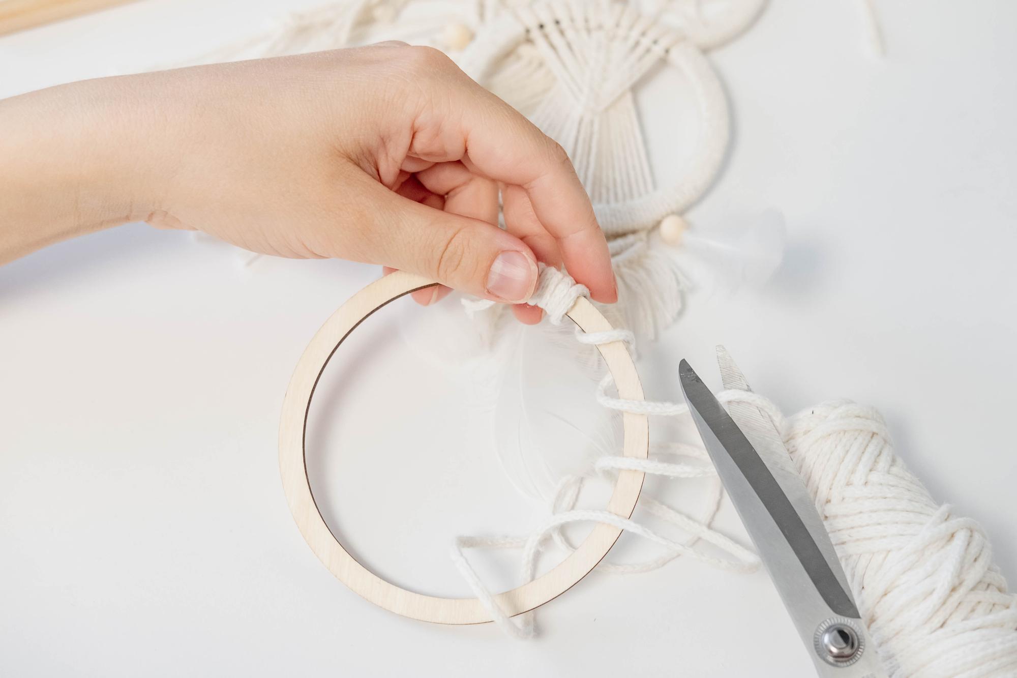 studio hands working at hoop with soft light