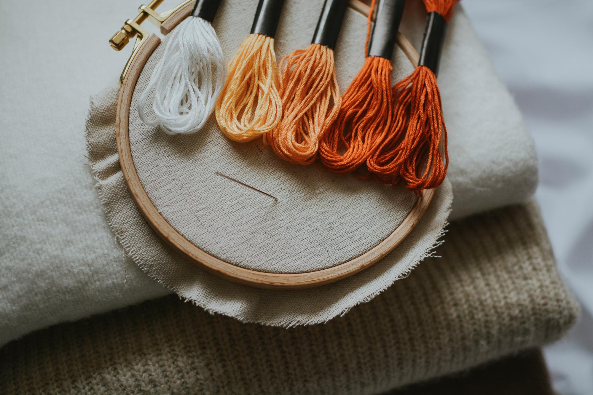 detailed luxury embroidery hoop on dark fabric